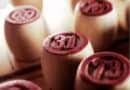 Close-up of numbered wooden chips, with the number 31 prominently displayed in focus.